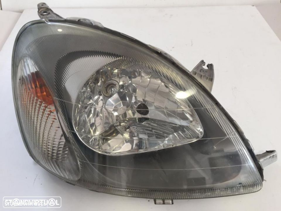 farol optica frente direito toyota yaris - 1