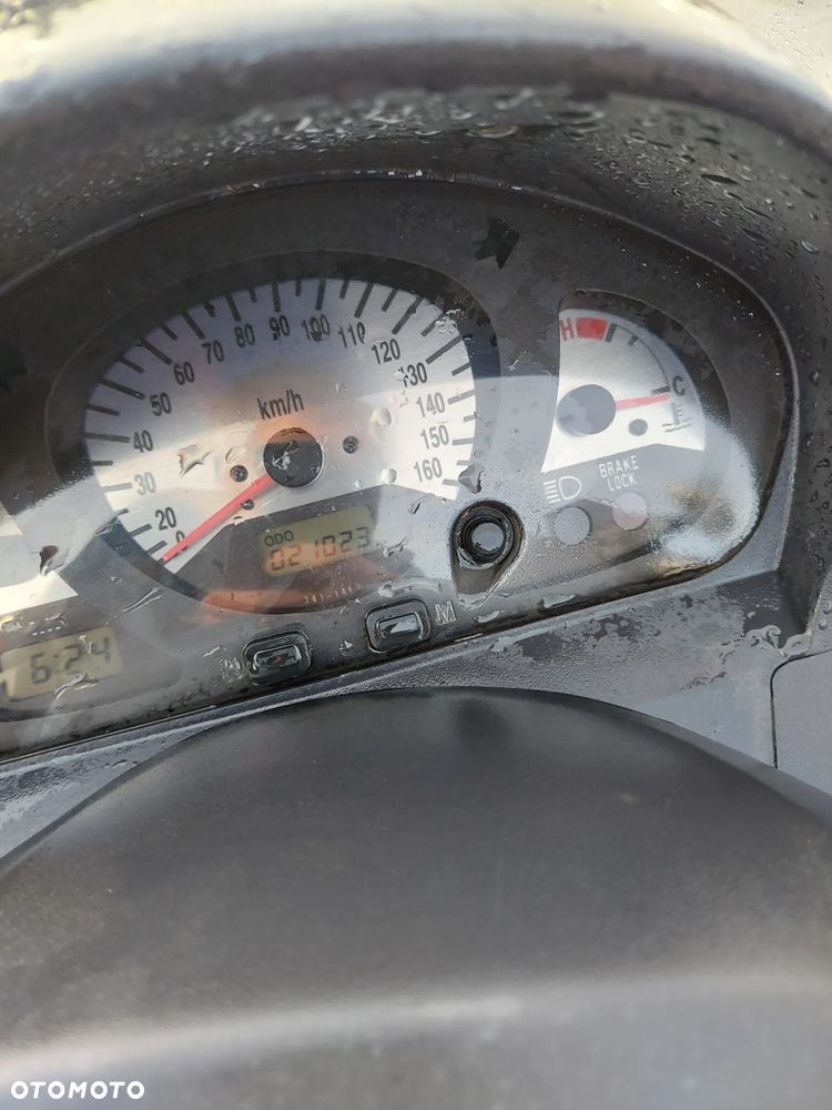 Suzuki Burgman - 4