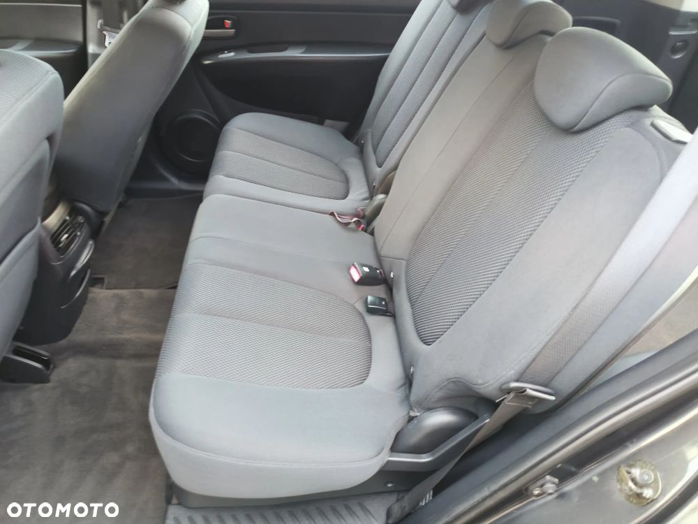 Kia Carens 2.0 CVVT Spirit - 7