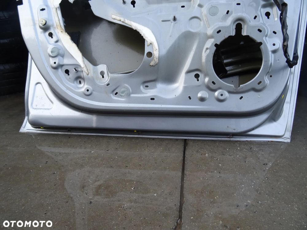 Drzwi Opel Corsa F Lewy Przód (gołe) - 11