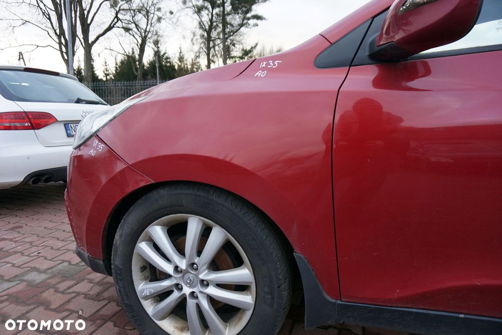 MASKA ZDERZAK BŁOTNIKI LAMPY IX35 I AA1 A0  HYUNDAI 2009-2015 CZERWONY (INFRA RED) PRZÓD KOMPLETNY - 19