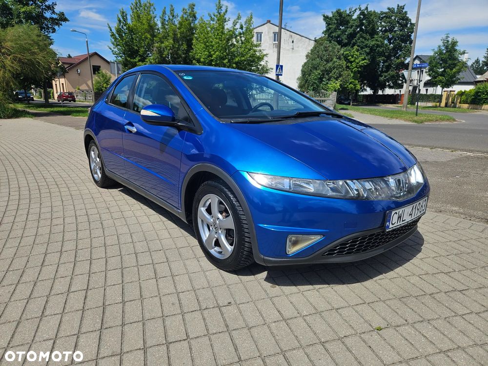 Honda Civic 1.4i-DSi Comfort - 1