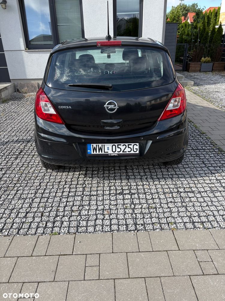Opel Corsa 1.4 16V Enjoy - 8