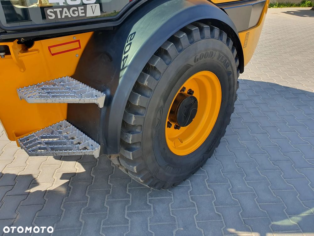 JCB 409 - 14