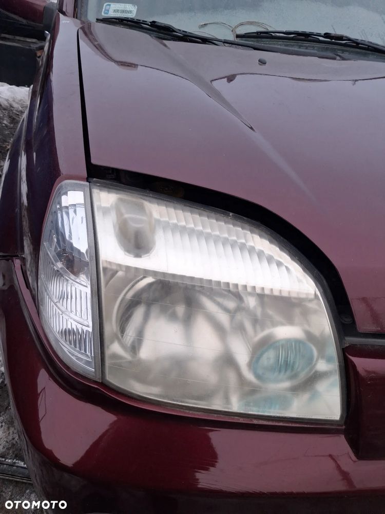 NISSAN X-TRAIL T30 01 REFLEKTOR PRAWY LAMPA PRZOD - 1