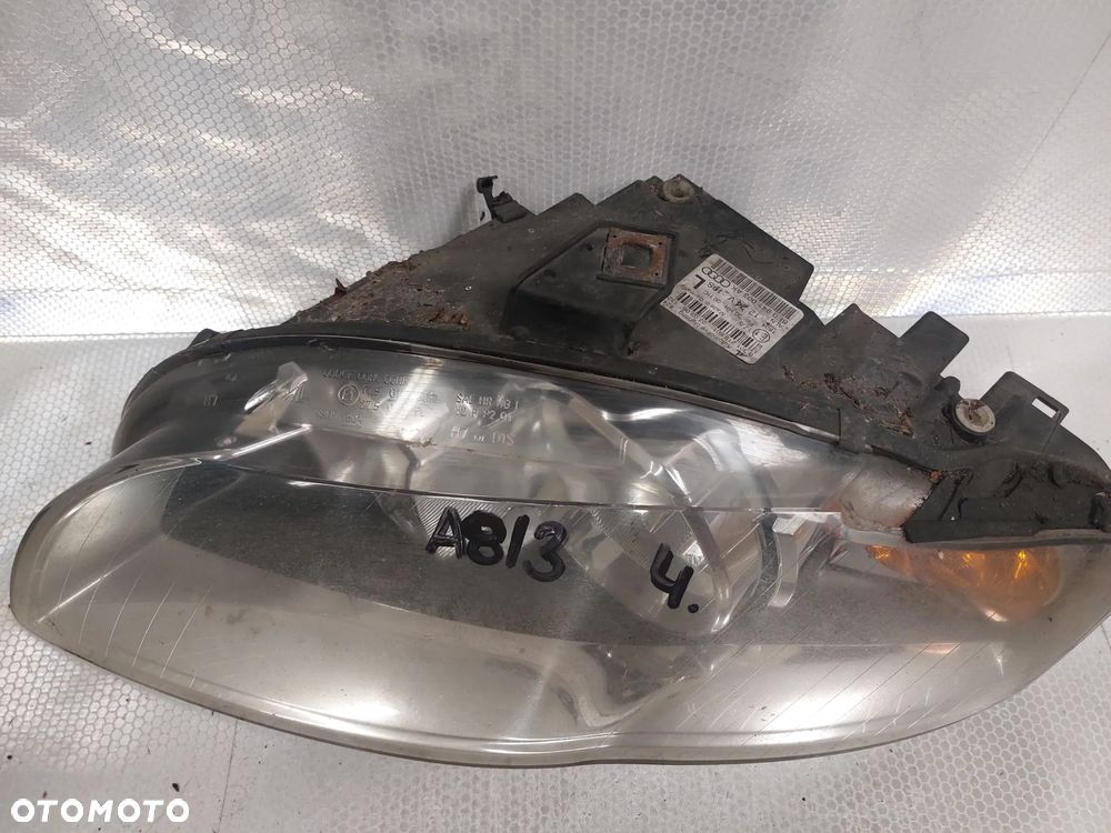 .  LAMPA PRZOD PRZEDNIA LEWA AUDI A4 B7 - 2