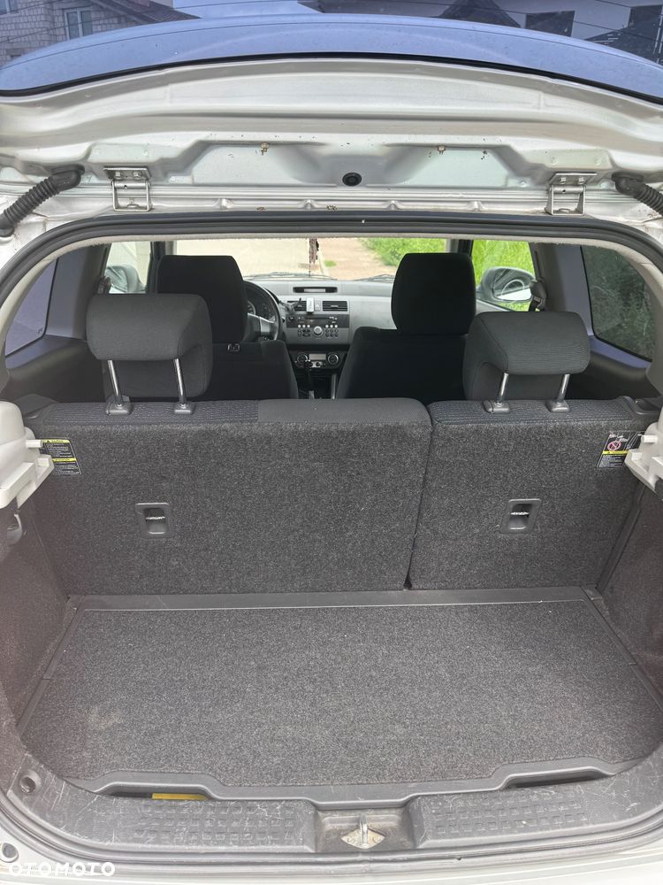 Suzuki Swift 1.3 Club - 8