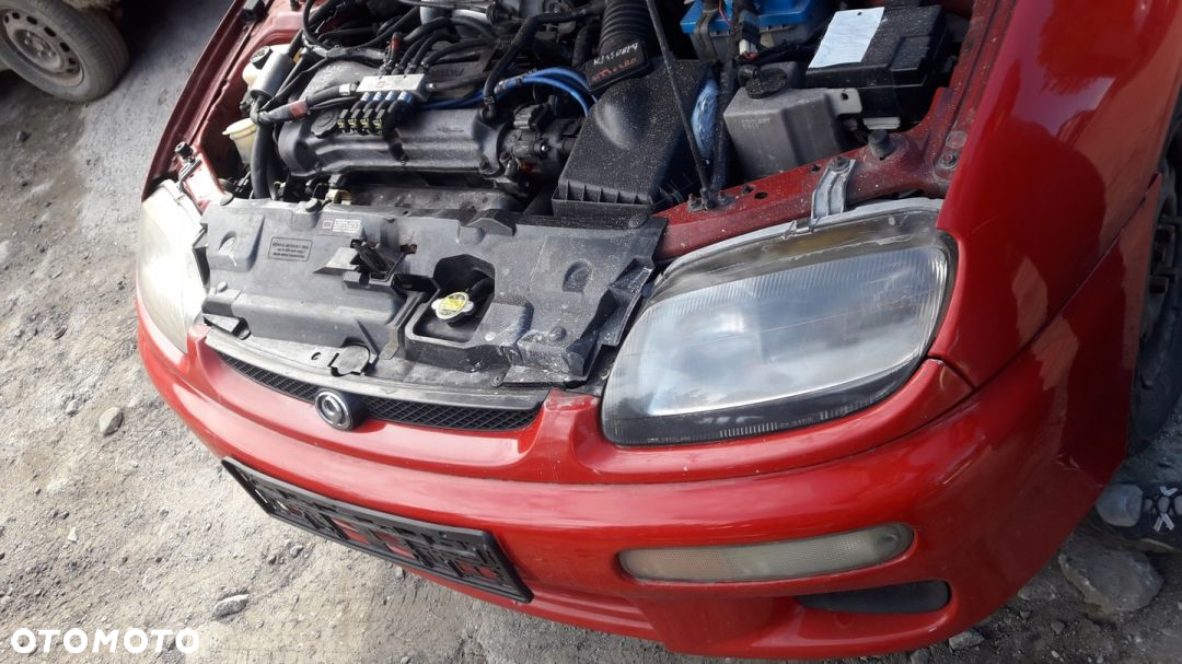 Mazda 323 323c ba 94-98 Maska lampa zderzak pas atrapa w kolor SU - 2