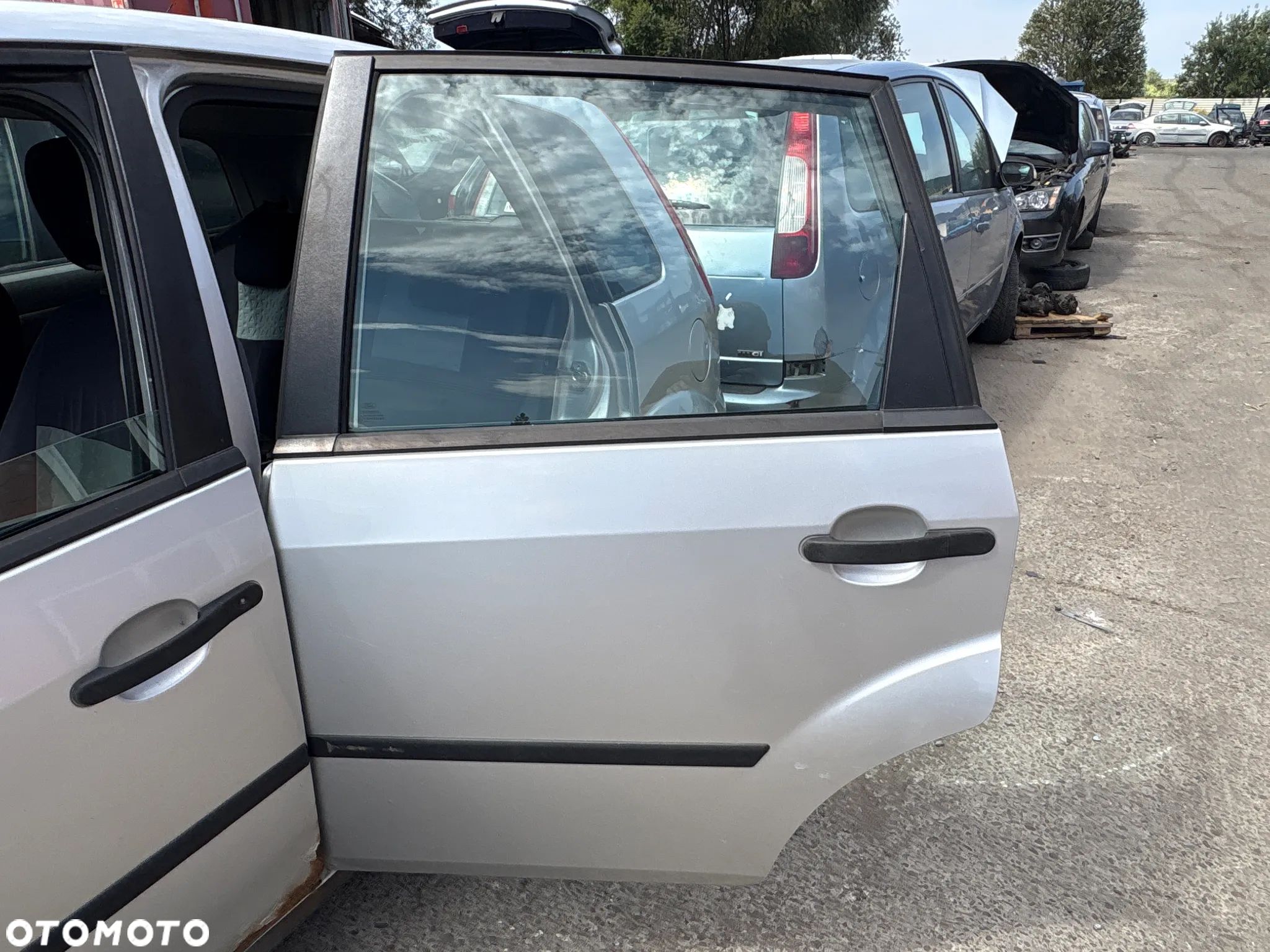 DRZWI LEWE TYLNE FORD FIESTA 2002R 1.3 - 1