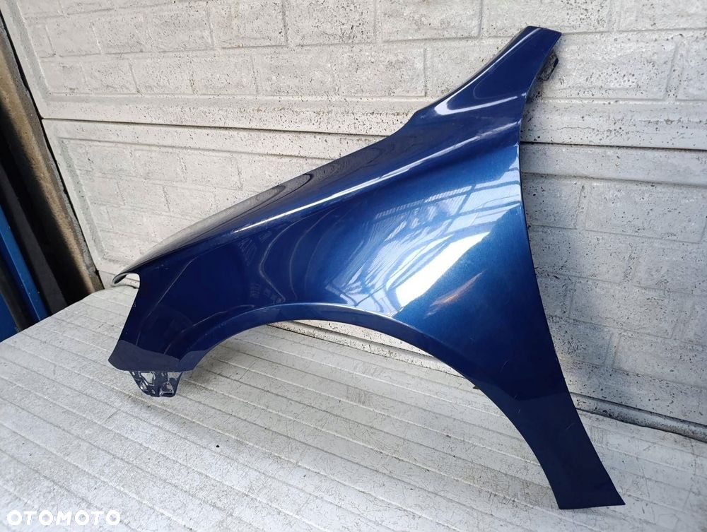 skoda octavia ii 2 lift 08-13 błotnik lewy przód oryginał - 3