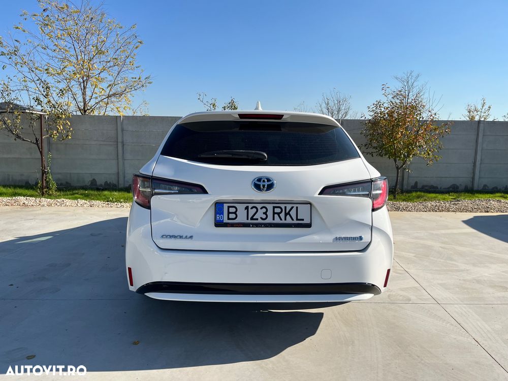 Toyota Corolla Sedan 1.8 HSD Business - 8