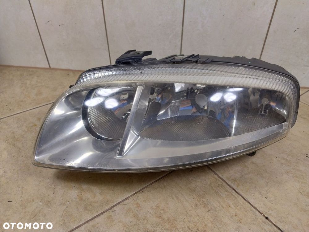 Alfa Romeo GT 03-10 lampa reflektor lewy przód oryginał wysyłka - 1