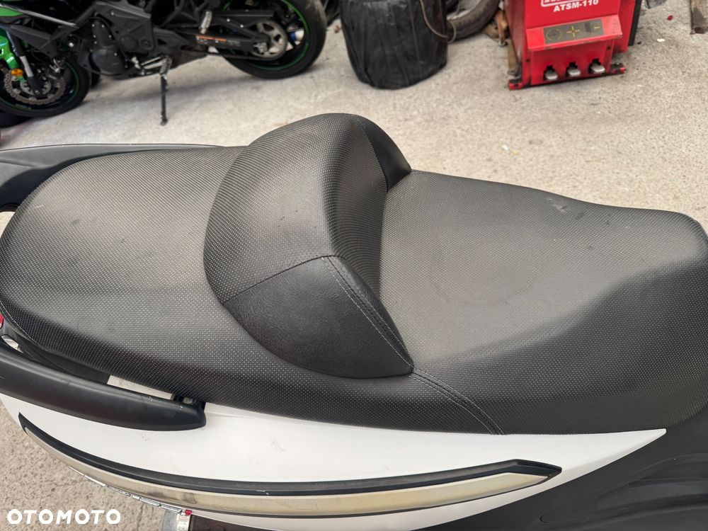 SYM GTS - 11