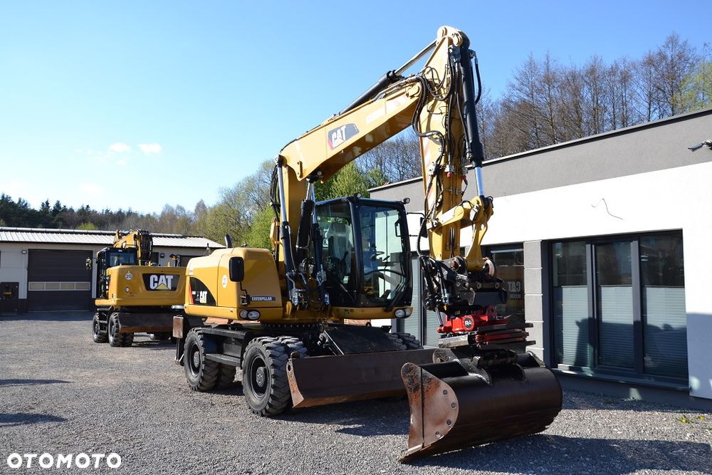 Caterpillar M 313 D, ROTOTILT - 15