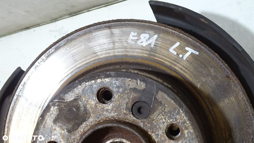 ZWROTNICA PIASTA LEWY TYŁ BMW E81 116i 2.0 - 2