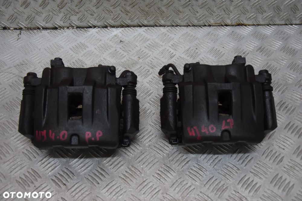 JEEP CHEROKEE WJ ZACISK LEWY PRAWY PRZÓD AKEBONO - 1