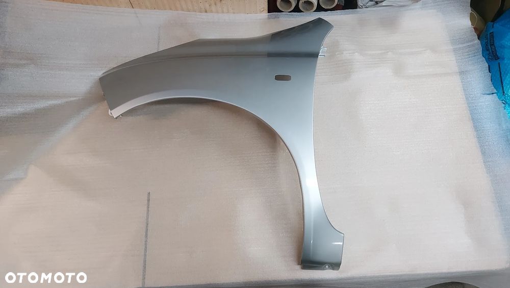 NISSAN MICRA K12 03-10 rok BŁOTNIK LEWY LUB PRAWY KY0 CYNK - 1