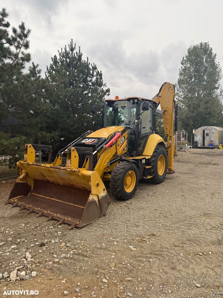 Caterpillar 428 - 1