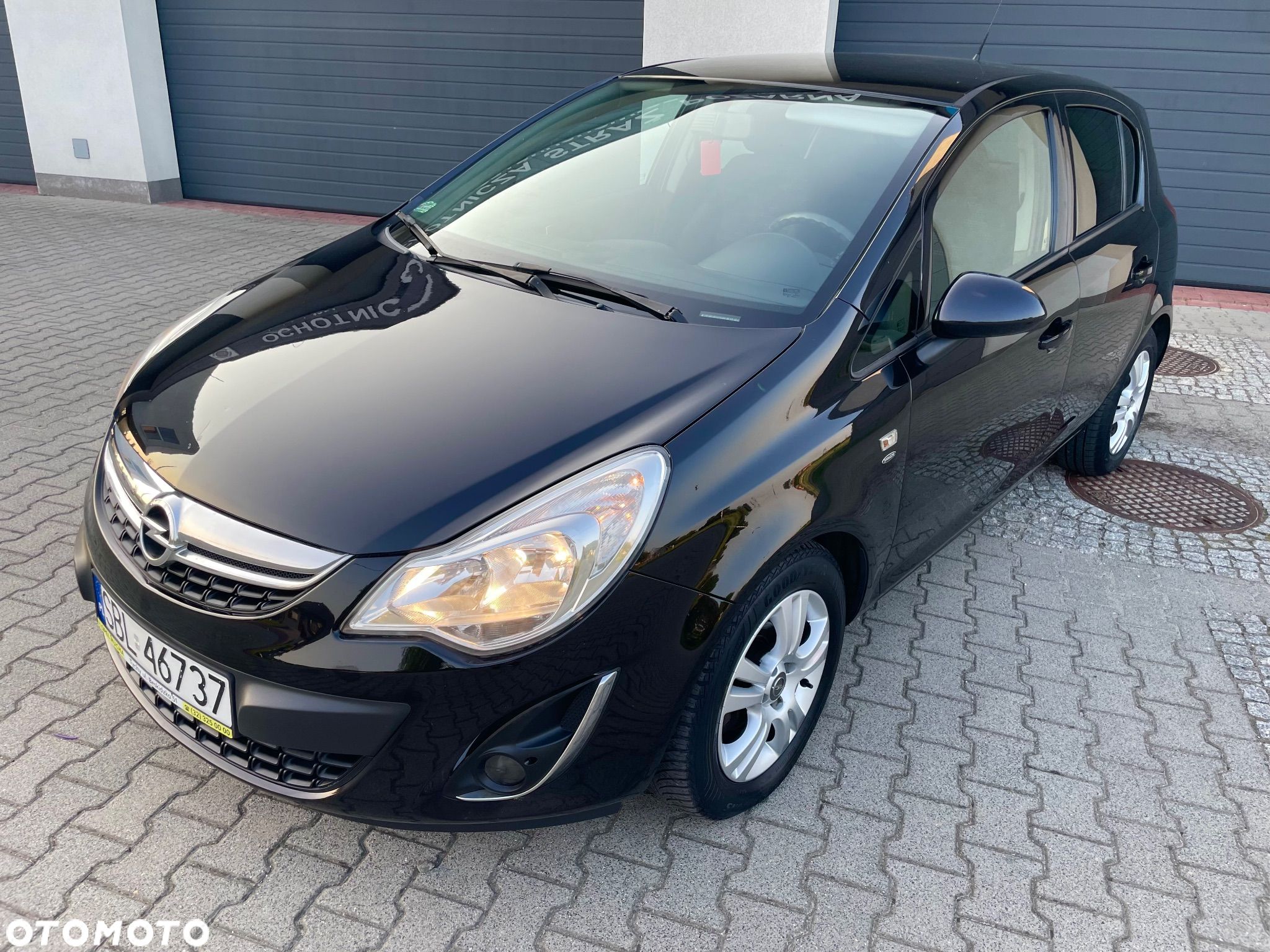 Opel Corsa 1.2 16V Cosmo - 1