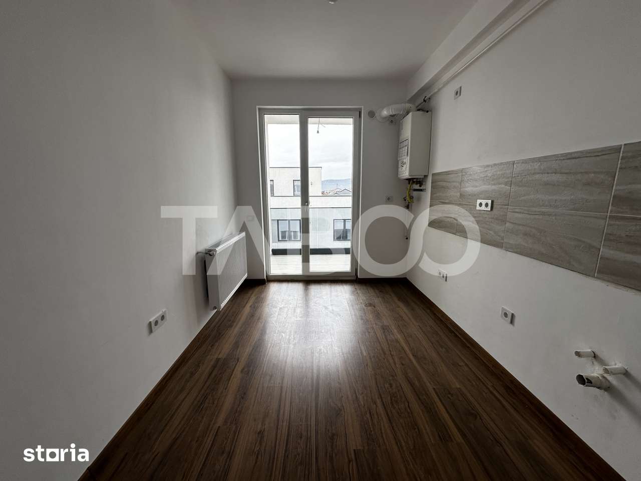 Garsoniera decomandata de vanzare 47 mpu logie loc de parcare Selimbar — fotografia 3