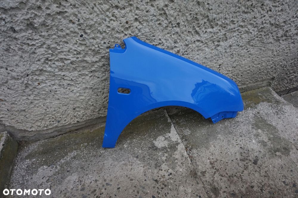 BŁOTNIK PRZÓD PRAWY VW POLO 9N OKULAR LA5F 01/05r - 2