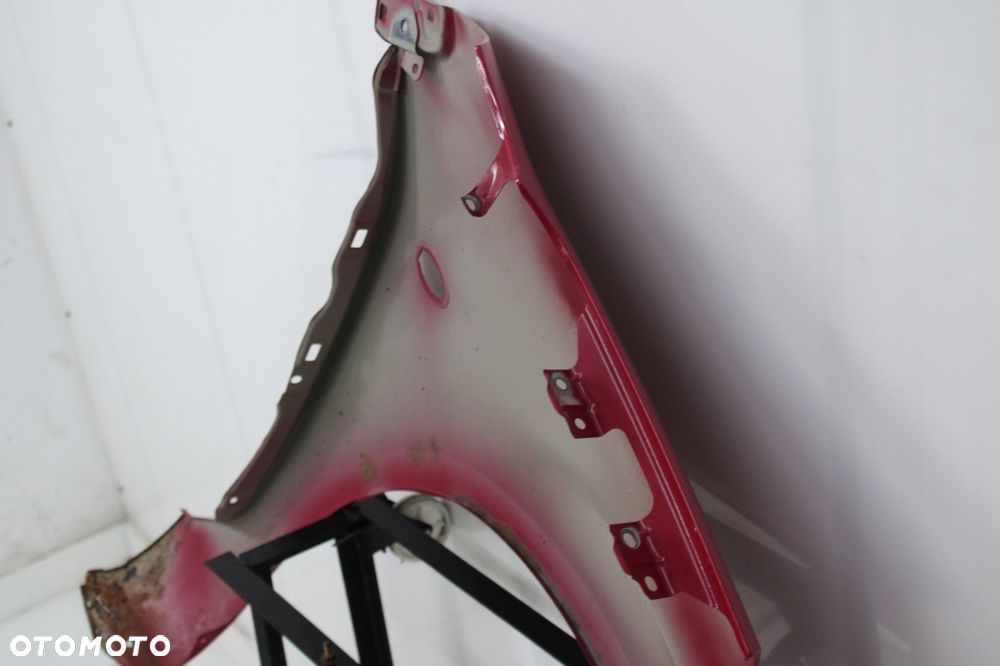 SUZUKI SPLASH 08R- BŁOTNIK LEWY PRZÓD PRZEDNI ZCF - 13