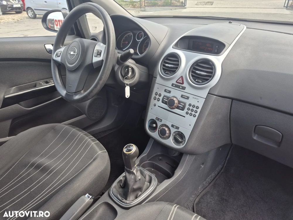 Opel Corsa 1.2i Cosmo - 7