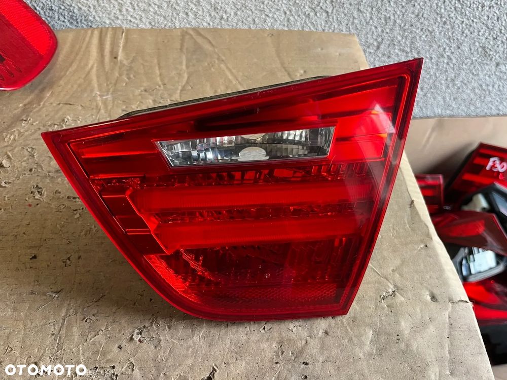 LAMPA BMW 3 E90 PRAWY TYŁ EUROPA LIFT W KLAPĘ 4871734 - 1