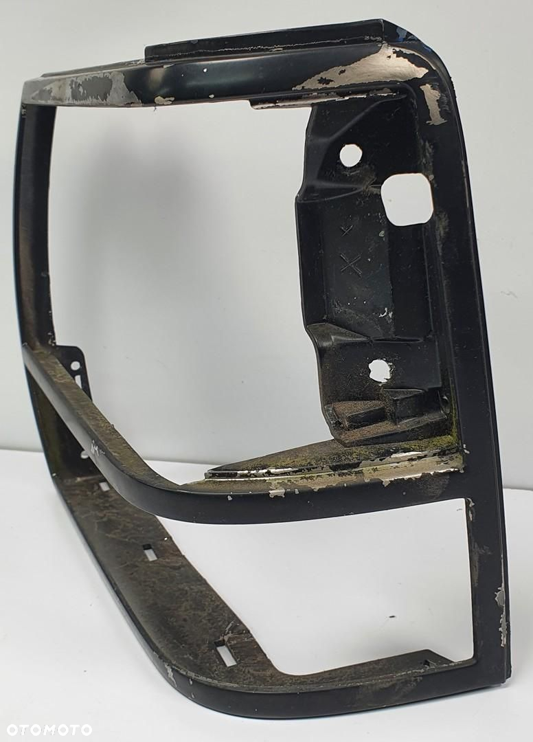 RAMKA LAMPY REFLEKTORA LEWY PRZÓD FORD RANGER II 89-92R E97B-13064 - 2