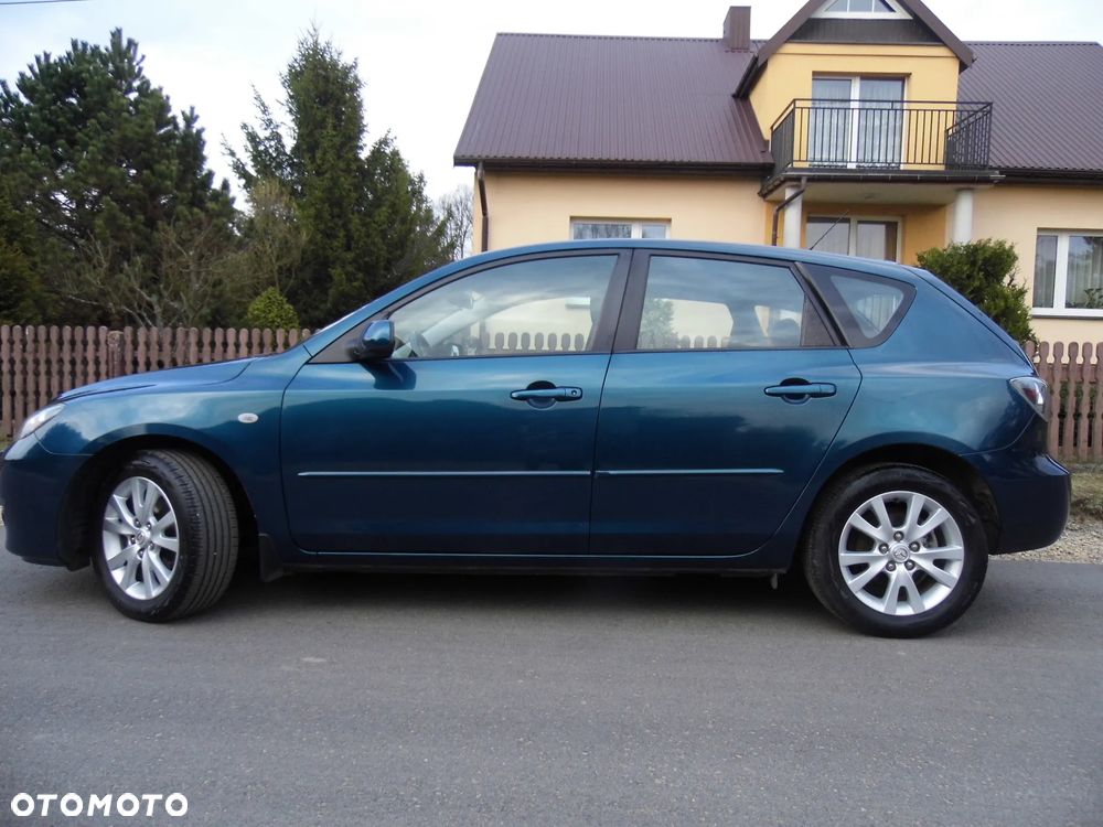 Mazda 3 1.6 16V Exclusive - 4