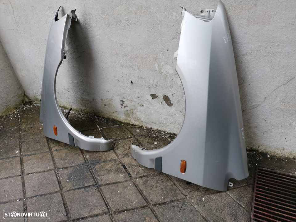 Guarda lamas direito mitsubishi space star 1999 a 2001 - 2