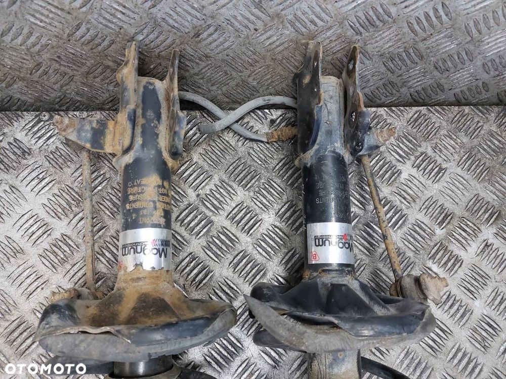 AMORTYZATOR SPRĘŻYNA LEWY PPRAWY PRZÓD PEUGEOT PARTNER I LIFT 2.0 HDI - 4