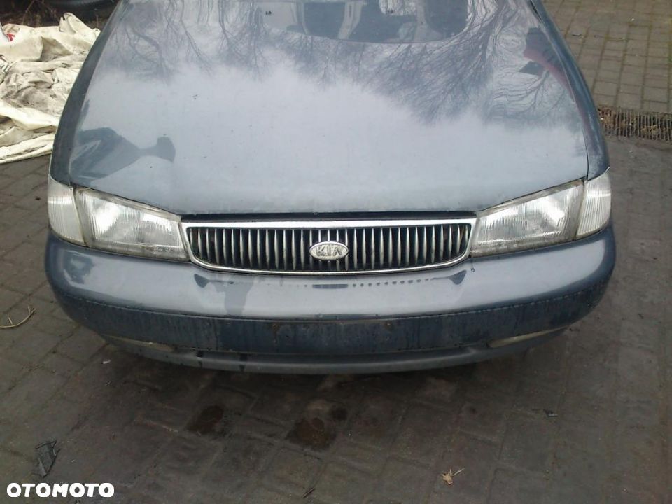 ATRAPA KIA CLARUS  96-99 - 1