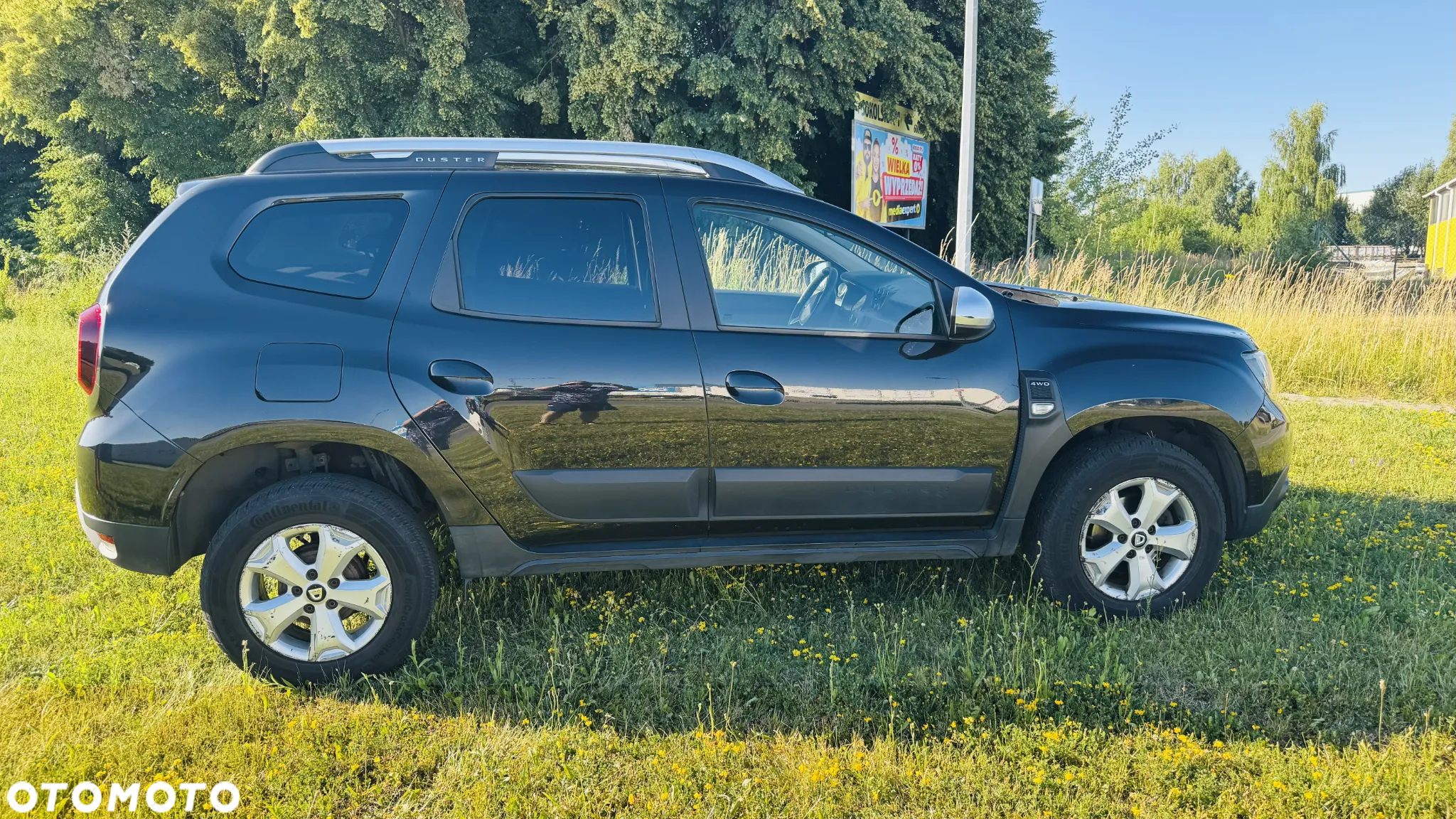 Dacia Duster 1.6 SCe Comfort 4WD - 7