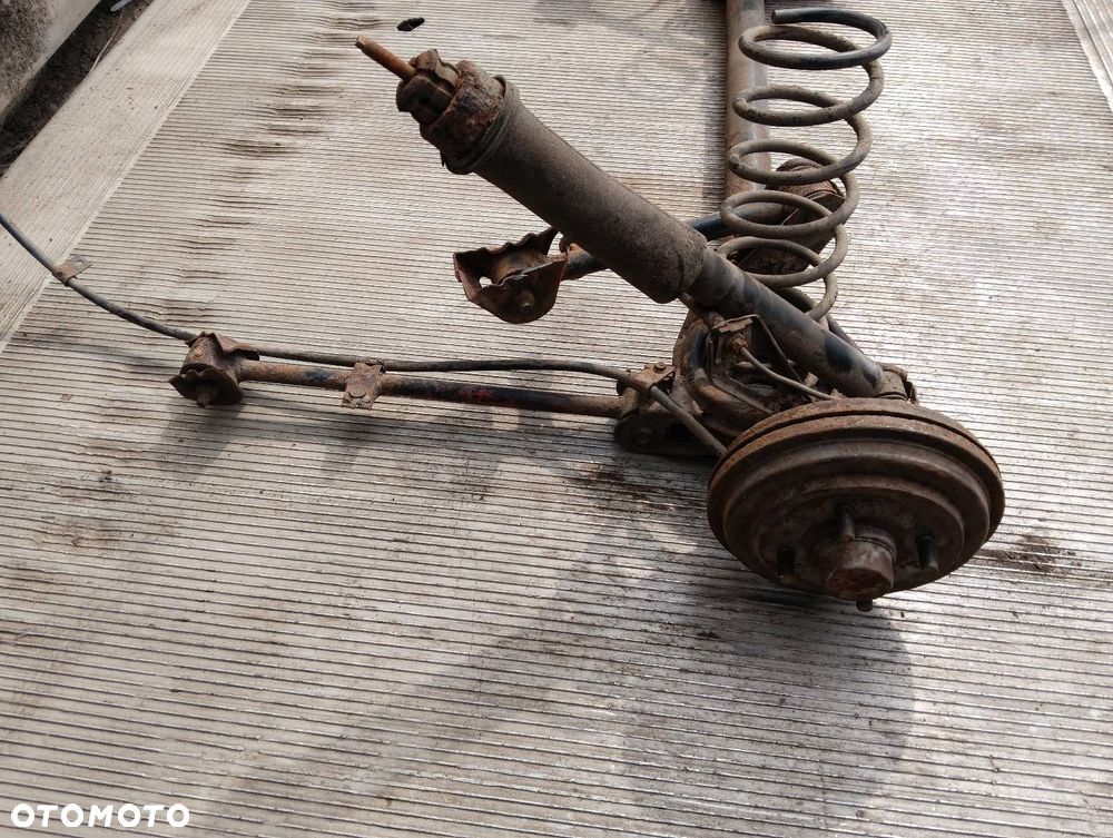 BELKA OŚ ZAWIESZENIA TYŁ BĘBNY BEZ ABS NISSAN MICRA K11 - 5