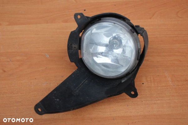 HALOGEN LEWY PRZEDNI KOSZYCZEK OPEL ANTARA PRZED LIFTEM