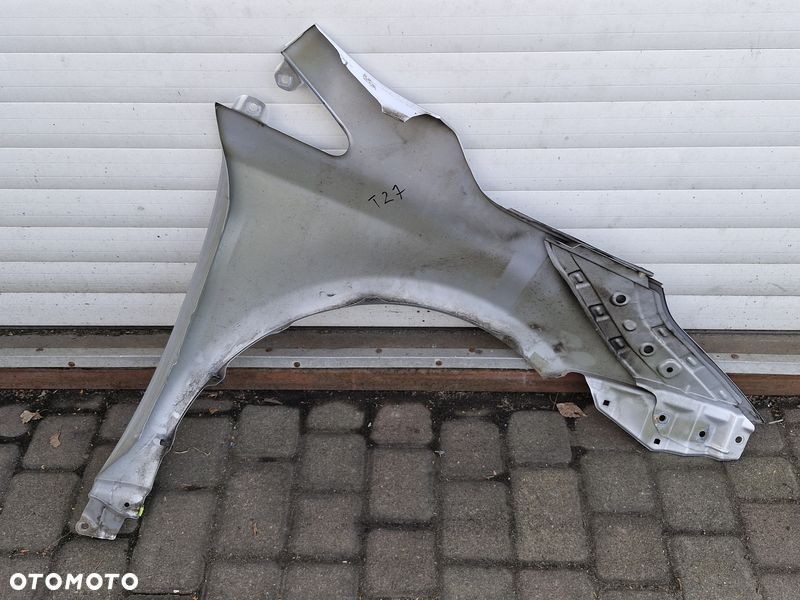 TOYOTA AVENSIS T27 LIFT T29 BŁOTNIK LEWY PRZÓD PRZEDNI 1F7 - 7
