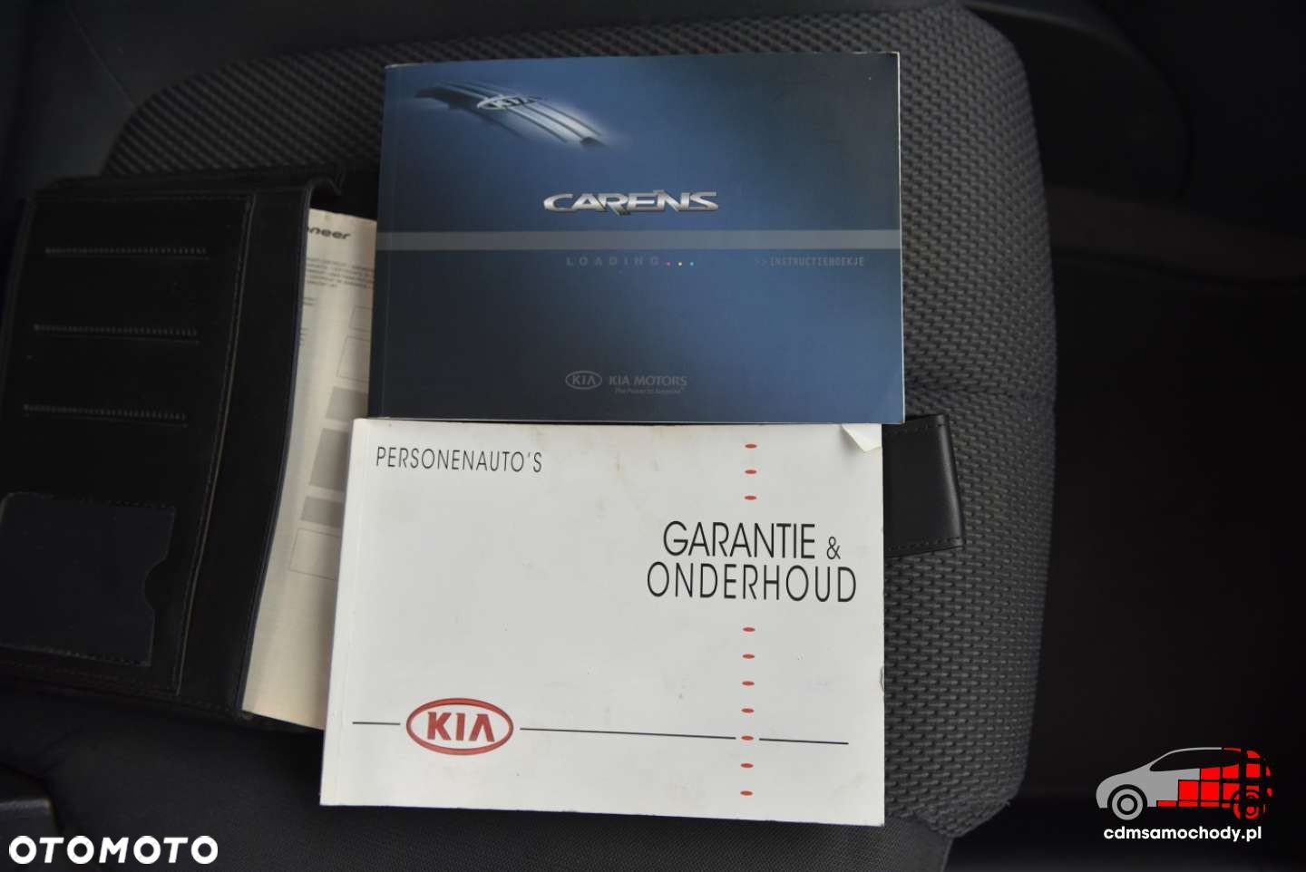 Kia Carens - 23