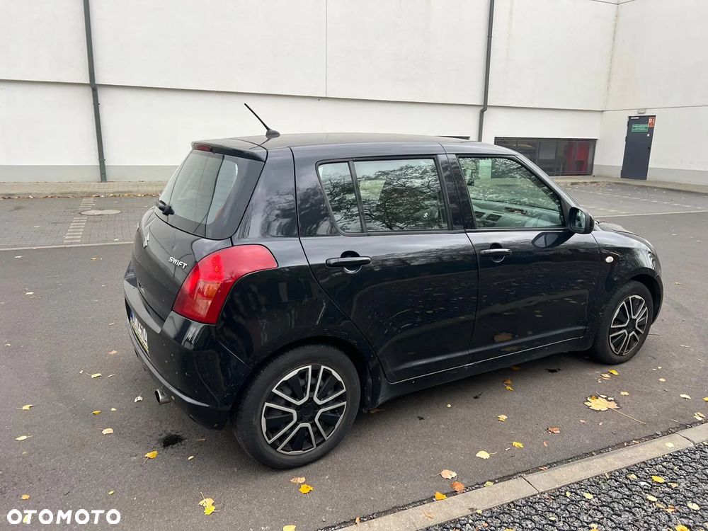 Suzuki Swift 1.3 Club - 8
