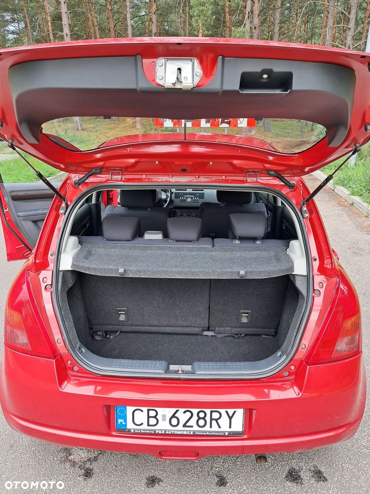 Suzuki Swift 1.3 Club - 12
