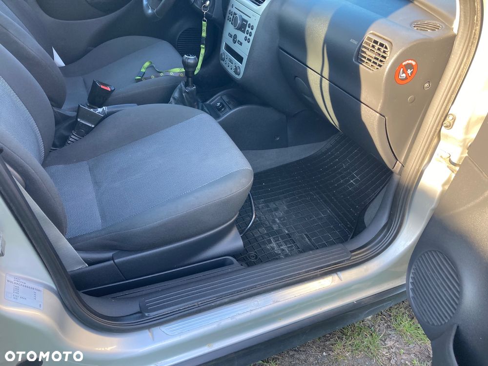 Opel Corsa 1.2 16V Cosmo - 4