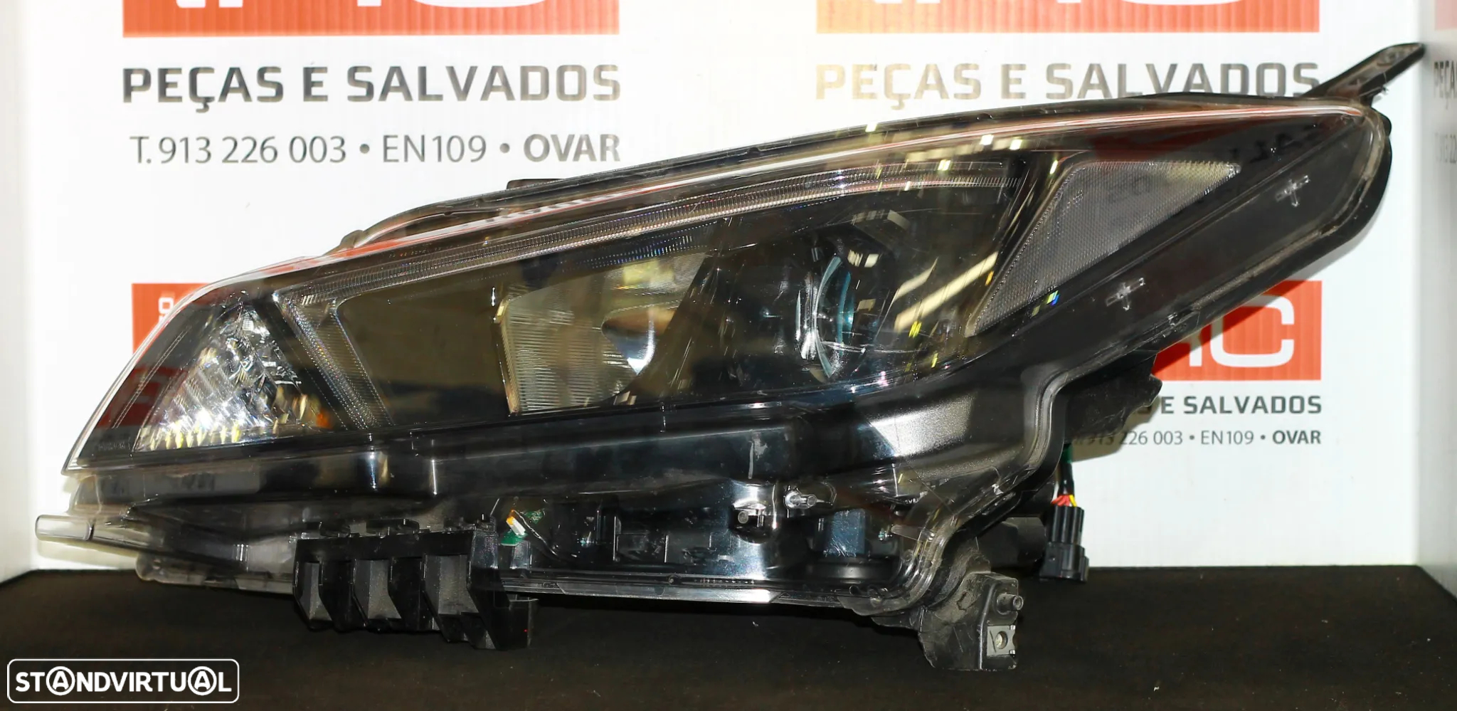 ÓPTICA ESQUERDA NISSAN LEAF - 2