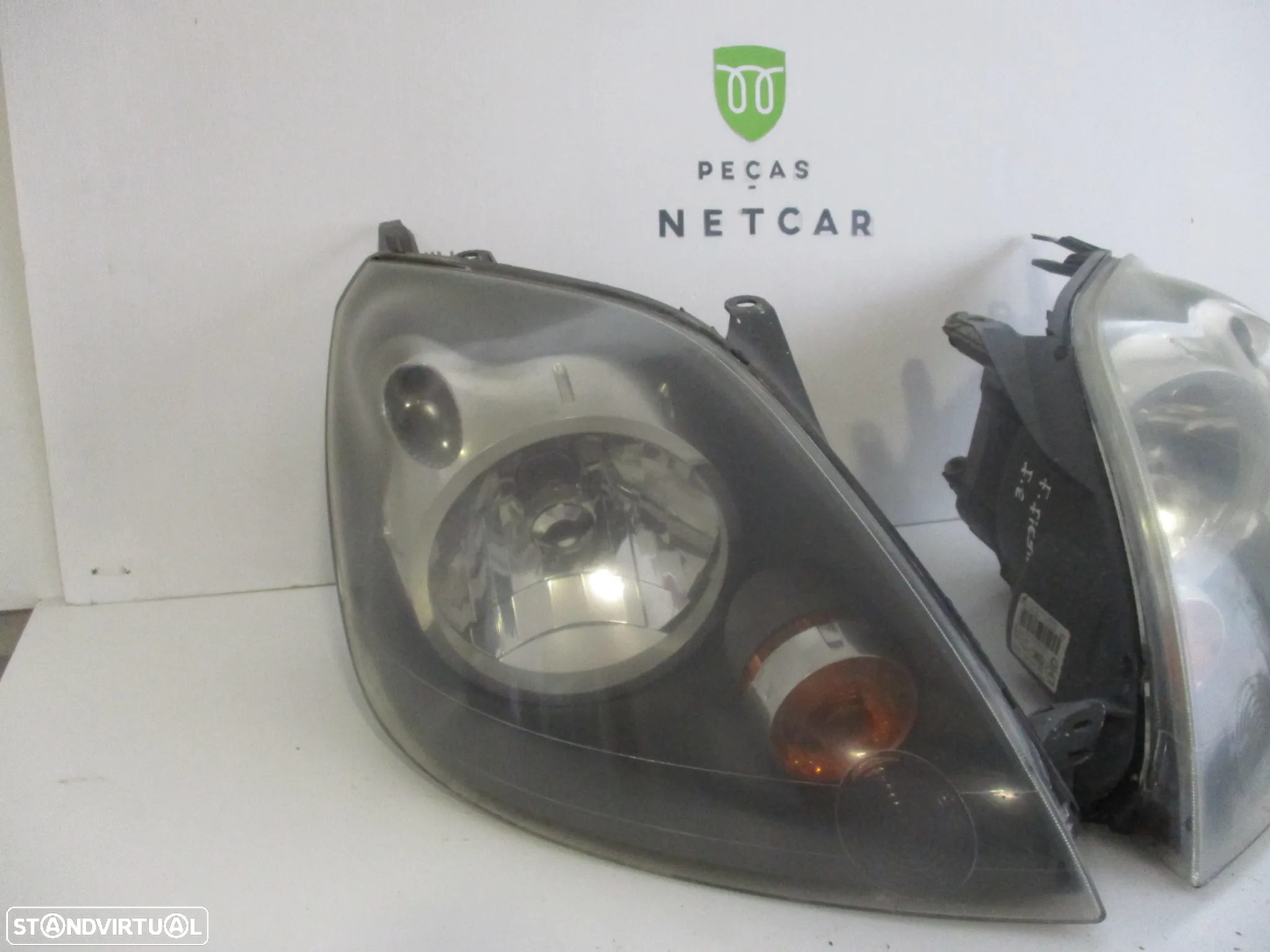 farol optica ford fiesta 2006 - 3