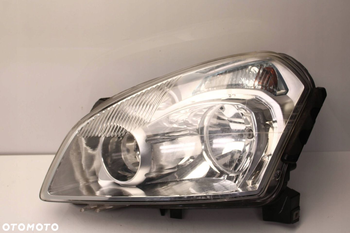 NISSAN QASHQAI J10 06R- REFLEKTOR PRZEDNI LEWY LAMPA LEWA PRZÓD - 1