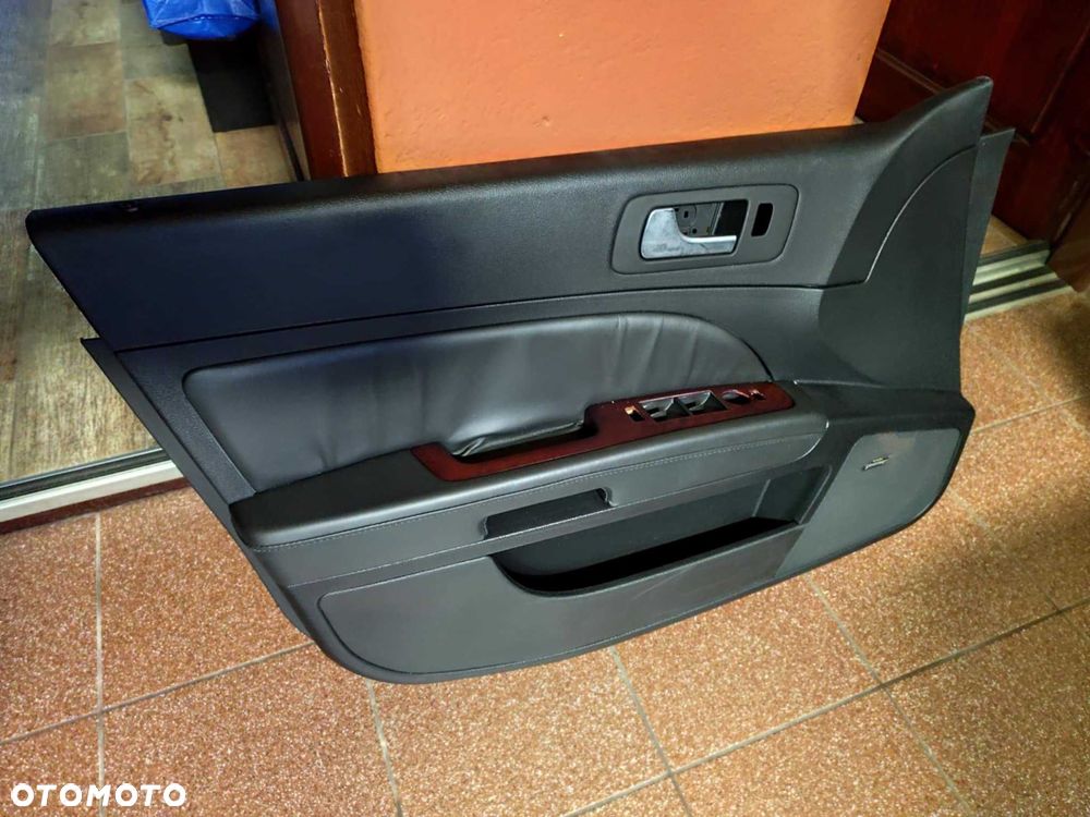 Cadillac STS tapicerka drzwi lewych przednich 2005-11
