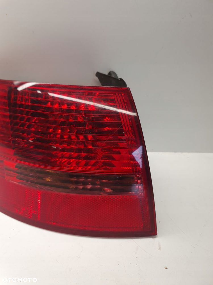 LAMPA LEWY TYŁ W BŁOTNIK AUDI A6 C6 4F9945095 - 2