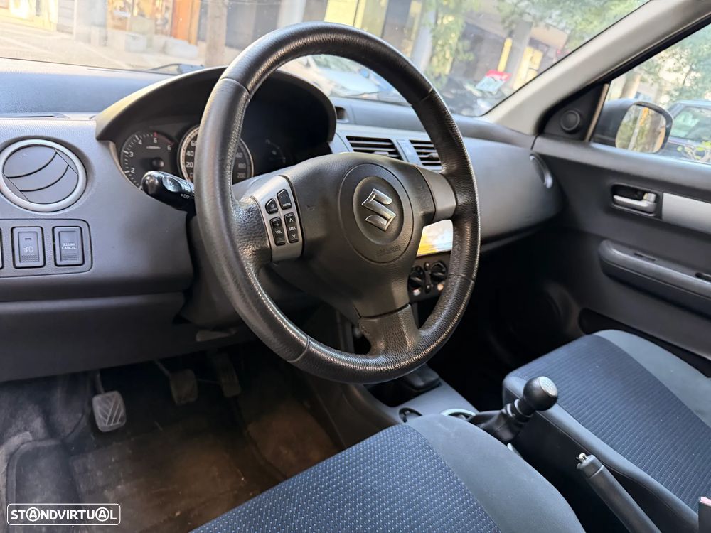 Suzuki Swift 1.3 DDiS Quiksilver - 9