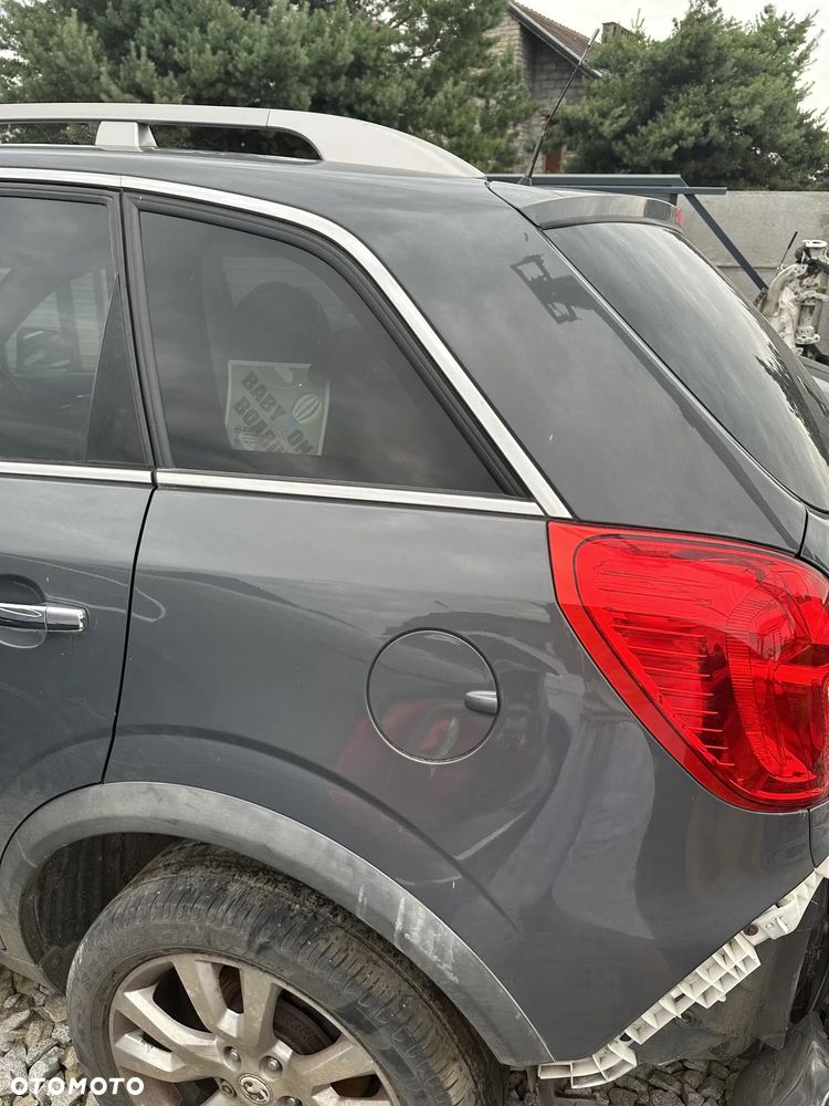 BŁOTNIK TYŁ LEWY OPEL ANTARA 2013 - 1