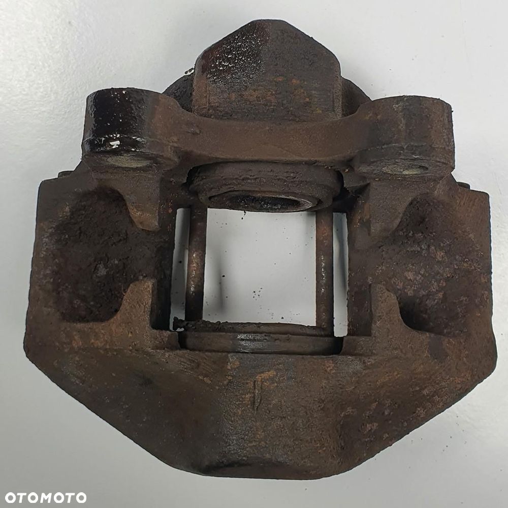 ZACISK HAMULCOWY LEWY TYŁ TYLNY MERCEDES W115 - 4