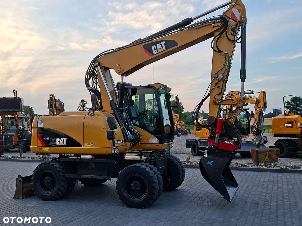 Caterpillar CAT M313D ROTOTILT - 1